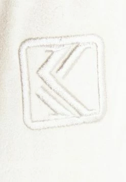 Karl Kani CROP - Débardeur Prix Abordable casquettes, bonnets et chapeaux col en v profond female -Karl Kani Soldes Boutique 046b4dc810c64258849c30deae98a1b2