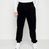 Haute Qualité Karl Kani SMALL SIGNATURE PANTS UNISEX - Pantalon de survêtement joggings haute -Karl Kani Soldes Boutique 153d89fba10f44c3bb9872688e31a482
