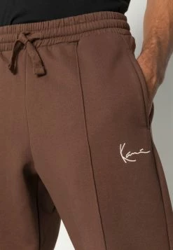 Karl Kani Soldes SMALL SIGNATURE - Pantalon de survêtement joggings normale male -Karl Kani Soldes Boutique 3c5c9e719e8e4b7bacdb13a3798bc9bf