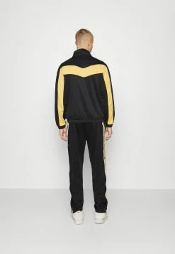 Karl Kani Vendre-Réclame TRACKPANTS - Pantalon de survêtement joggings haute male 10 Karl Kani Vendre-Réclame TRACKPANTS - Pantalon de survêtement joggings haute male -Karl Kani Soldes Boutique 48de965c4b79451c9972df89db8e25a1