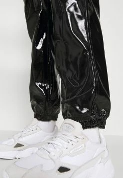 Prix Préférentiel Karl Kani SIGNATURE GLOSSY PANTS - Pantalon classique pantalons haute female -Karl Kani Soldes Boutique 4adf35d20a574935a6a068ebb9ceb3c8