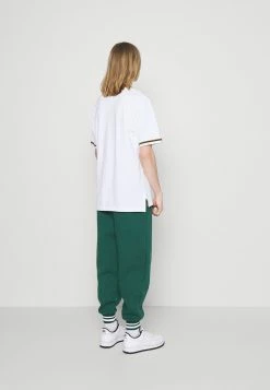 Karl Kani Remise En Ligne SMALL SIGNATURE TEE - Polo t-shirts col polo male -Karl Kani Soldes Boutique 4c1ad2aaf5654a35b1175950436dcf69