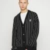 Prix Aimable Karl Kani PINSTRIPE CARDIGAN - Gilet pulls & gilets col en v profond unisex