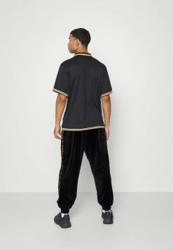 Karl Kani Qualité Garantie TAPE PANTS - Pantalon de survêtement joggings normale male 11 Karl Kani Qualité Garantie TAPE PANTS - Pantalon de survêtement joggings normale male -Karl Kani Soldes Boutique 5e49e46de858487d9c7c51888ff03b14