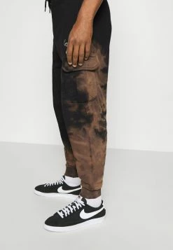 Karl Kani SMALL SIGNATURE BLEACHED UNISEX - Pantalon de survêtement Prix Jamais Vus joggings haute -Karl Kani Soldes Boutique 62b392221a7f473eaf3f4ae48fca293e