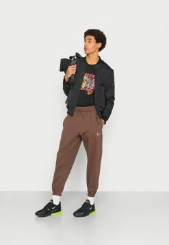 Karl Kani Soldes SMALL SIGNATURE - Pantalon de survêtement joggings normale male -Karl Kani Soldes Boutique 7bdcf0d096a14c9e8cf504e2fdb59b63