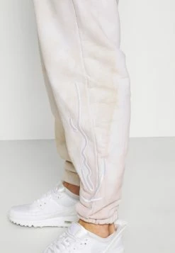 Prix Cassé Karl Kani SIGNATURE TIE DYE UNISEX - Pantalon de survêtement joggings normale -Karl Kani Soldes Boutique 966e2ece41f542448f30254deb325f87