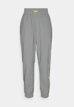 Karl Kani RETRO SHINY TRACKPANTS - Pantalon de survêtement En Remise pantalons haute female -Karl Kani Soldes Boutique af75493bbe844c8eb1e15feae825abcd