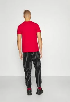 Karl Kani Prix Aimable SIGNATURE PINSTRIPE PANTS UNISEX - Pantalon de survêtement joggings normale -Karl Kani Soldes Boutique c6c4da083ca146158a66fc6cd8cadc18