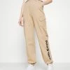 Karl Kani RETRO PANTS - Pantalon classique excellente qualité pantalons haute female 2 Karl Kani RETRO PANTS - Pantalon classique excellente qualité pantalons haute female -Karl Kani Soldes Boutique d00e0bf582c64a4d993343772374a5bd