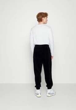 Haute Qualité Karl Kani SMALL SIGNATURE PANTS UNISEX - Pantalon de survêtement joggings haute -Karl Kani Soldes Boutique d4b91de9ab5149448f8c177228645607