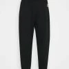 Karl Kani SMALL SIGNATURE UNISEX - Pantalon de survêtement Prix Sympa joggings élastiquée -Karl Kani Soldes Boutique ddd025314009434daa52b9c7cdd15334