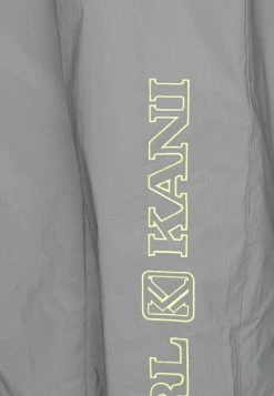 Karl Kani RETRO SHINY TRACKPANTS - Pantalon de survêtement En Remise pantalons haute female -Karl Kani Soldes Boutique e13fe0f679be48d69cefe1d4784eba79