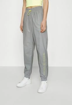 Karl Kani RETRO SHINY TRACKPANTS - Pantalon de survêtement En Remise pantalons haute female
